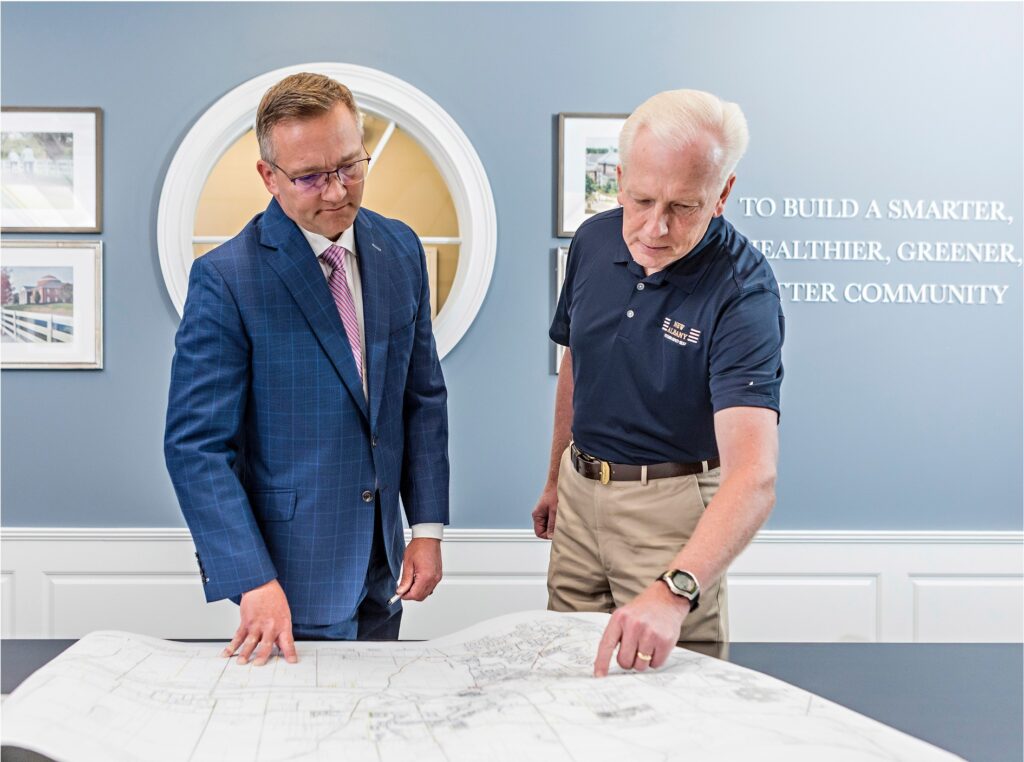 mayor and council man reviewing plans