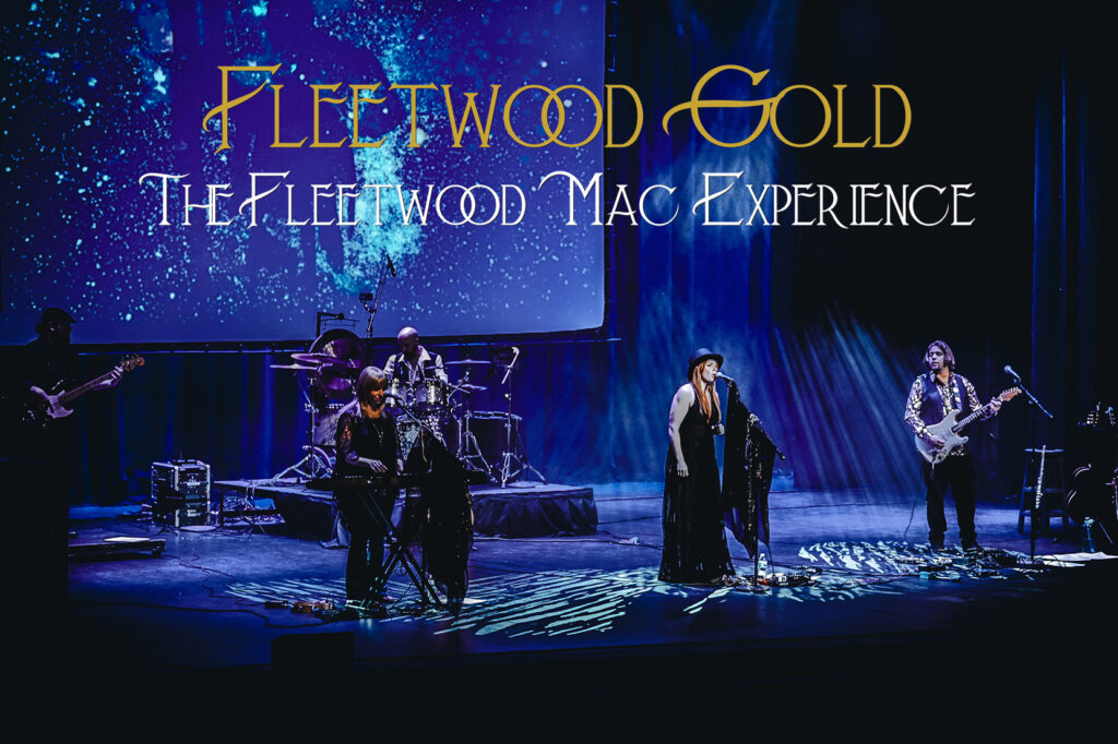 A band performing on stage under blue lighting, with a drummer, keyboardist, singer, and guitarist. The background features a starry visual display and text reading "Fleetwood Gold The Fleetwood Mac Experience."