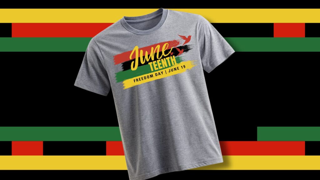 Gray t-shirt with colorful paint brush stroke design in red, black, green, and yellow featuring the text Juneteenth Freedom Day | June 19 with two red birds on the chest, set against a background with similar color stripes.
