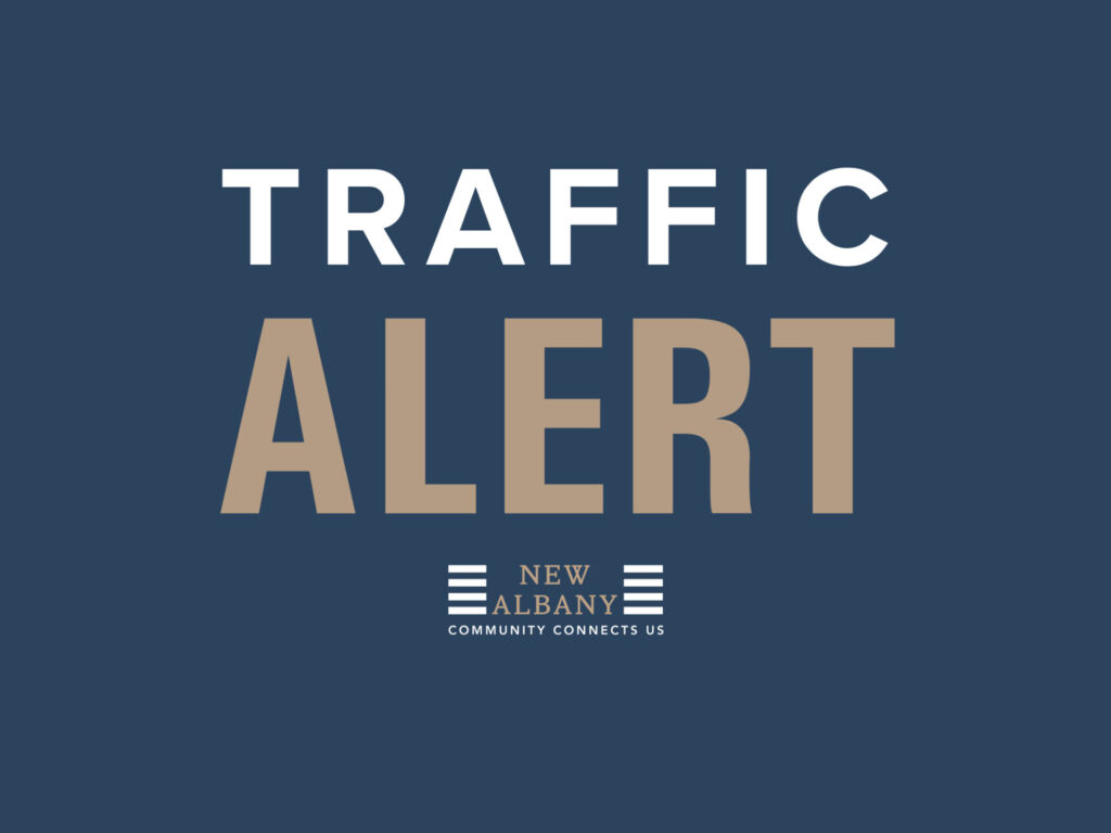 Bold text reading "TRAFFIC ALERT" in white and tan on a dark blue background with a small "New Albany Community Connects Us" logo beneath.