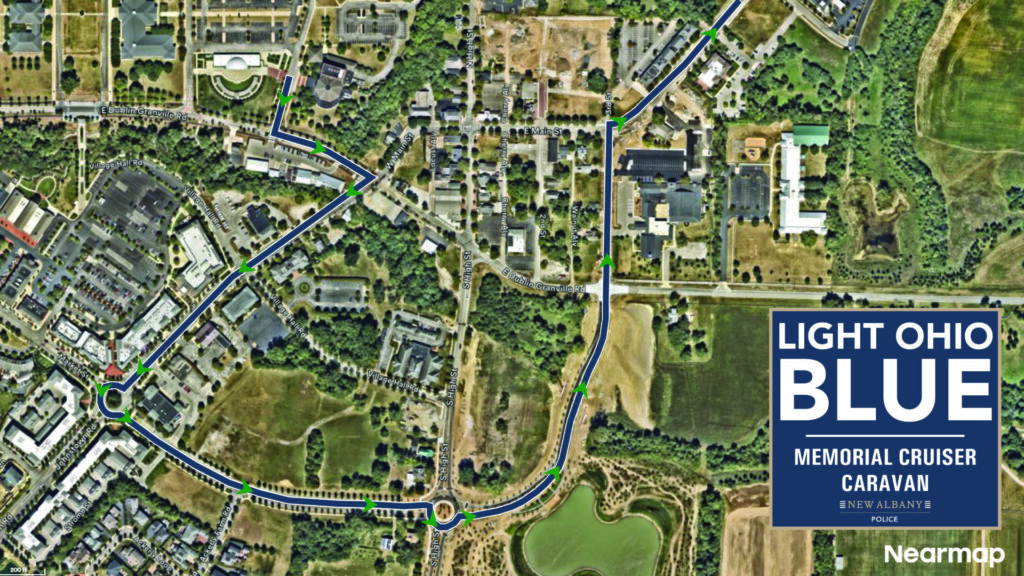 Aerial map of a suburban route marked with blue lines and green arrows around parks, buildings, and roundabouts, with event title panel