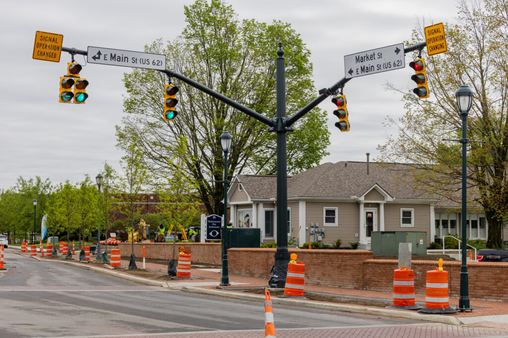 Street signs show the intersection of Market and Main streets.