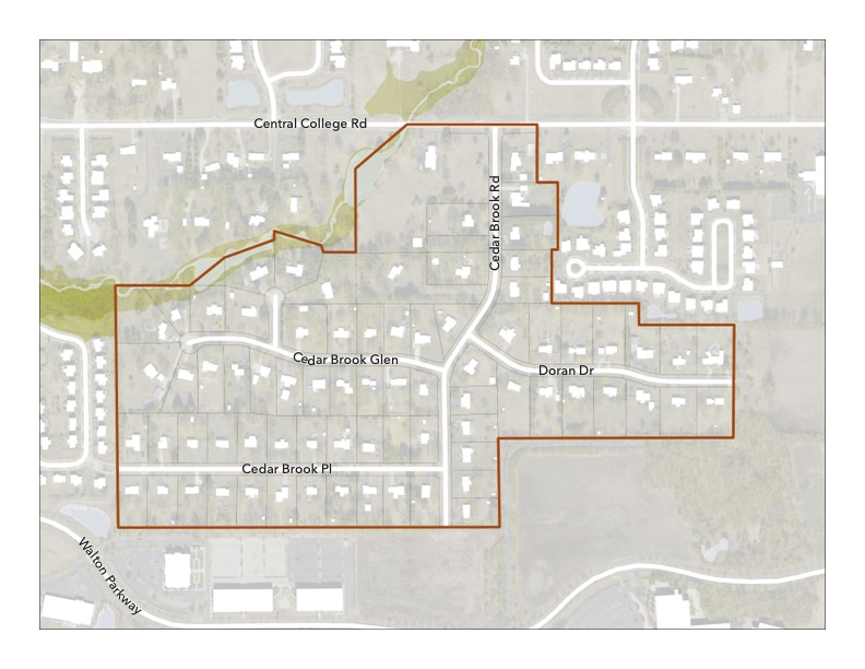 Overhead map view of the Cedar brook neighborhood. The map features a red line around the neighborhood.
